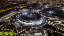 Al Wakrah Stadium at night drone shot_0.jpeg