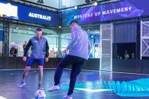 Tim Cahill and Maxi Rodriguez playing on the interactive Visa pitch .jpg