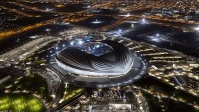 Al Wakrah Stadium at night drone shot_0.jpeg