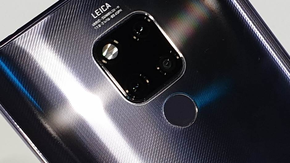 SAD Velika Britanija Huawei upozorenje