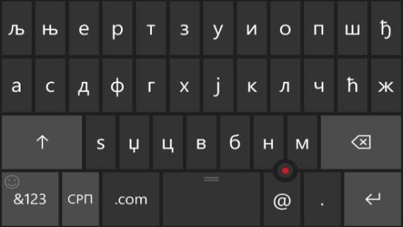 Ćirilična tastatura sa kursorom na Windows 10 Mobile.