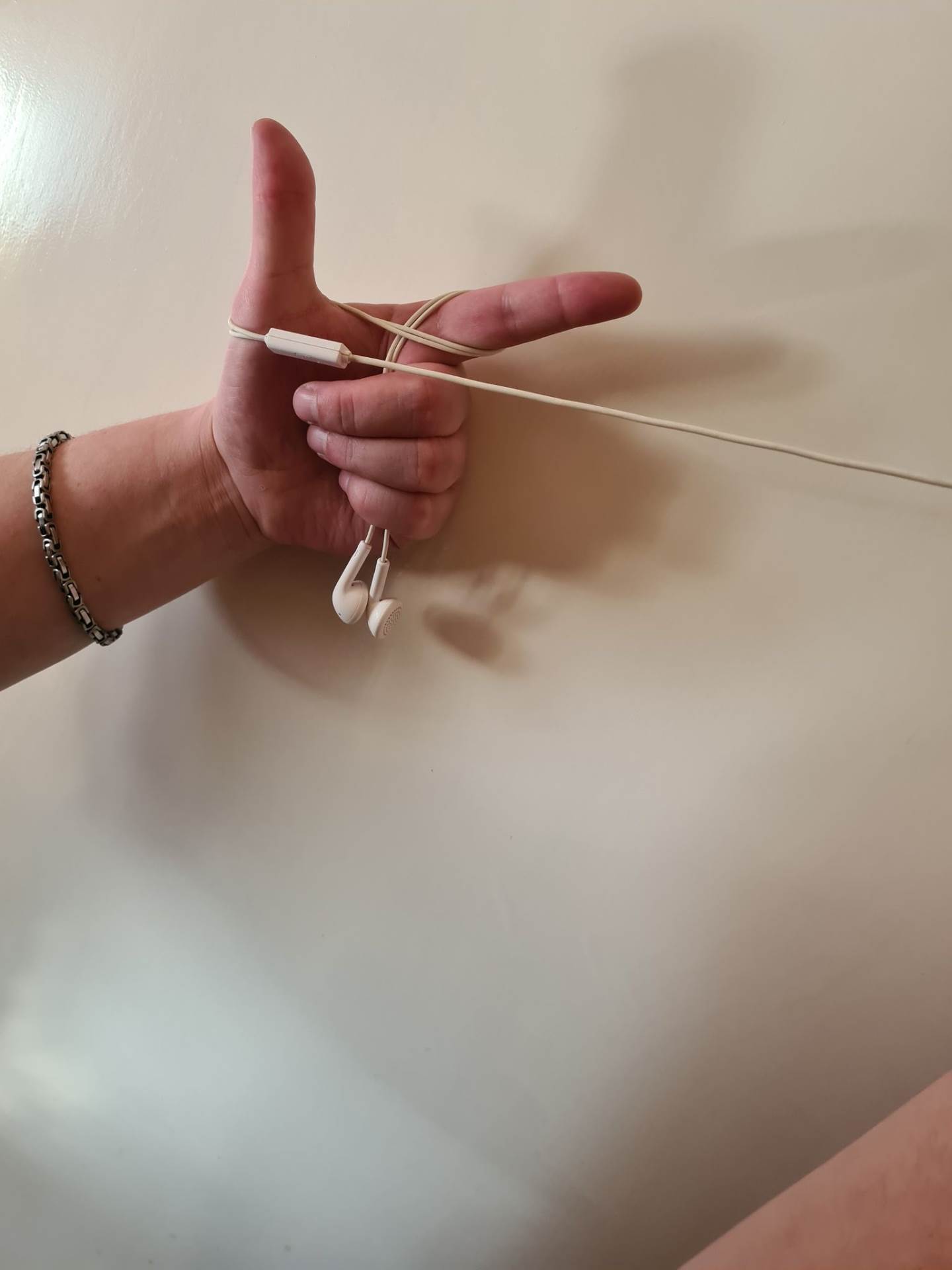 zapetljane slušalice zamršene mobilni telefoni kako spakovati slušalice da se ne zamrse kablovi