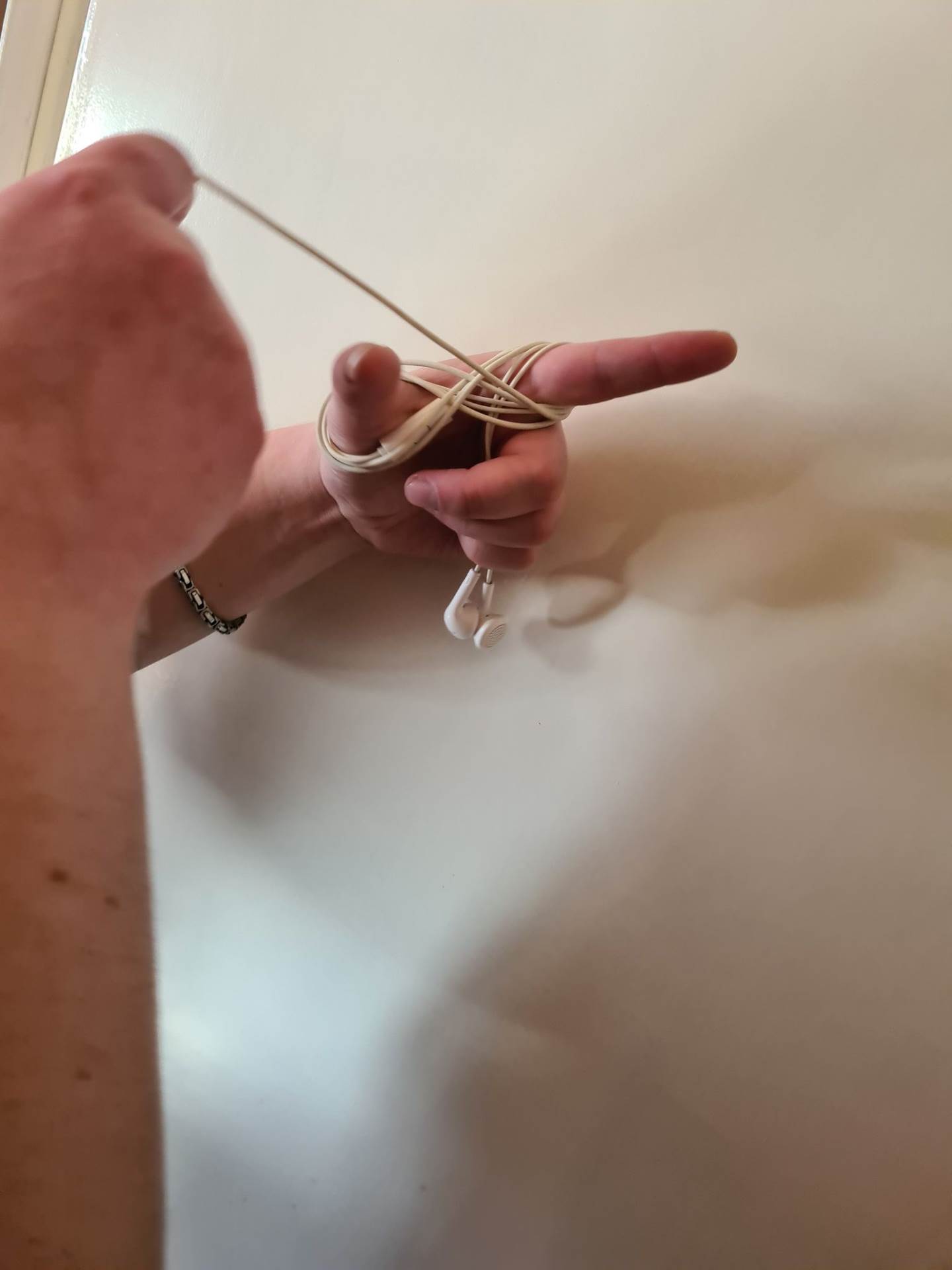 zapetljane slušalice zamršene mobilni telefoni kako spakovati slušalice da se ne zamrse kablovi