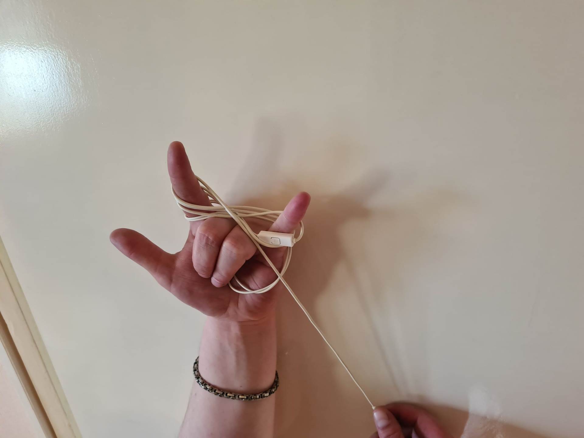 zapetljane slušalice zamršene mobilni telefoni kako spakovati slušalice da se ne zamrse kablovi