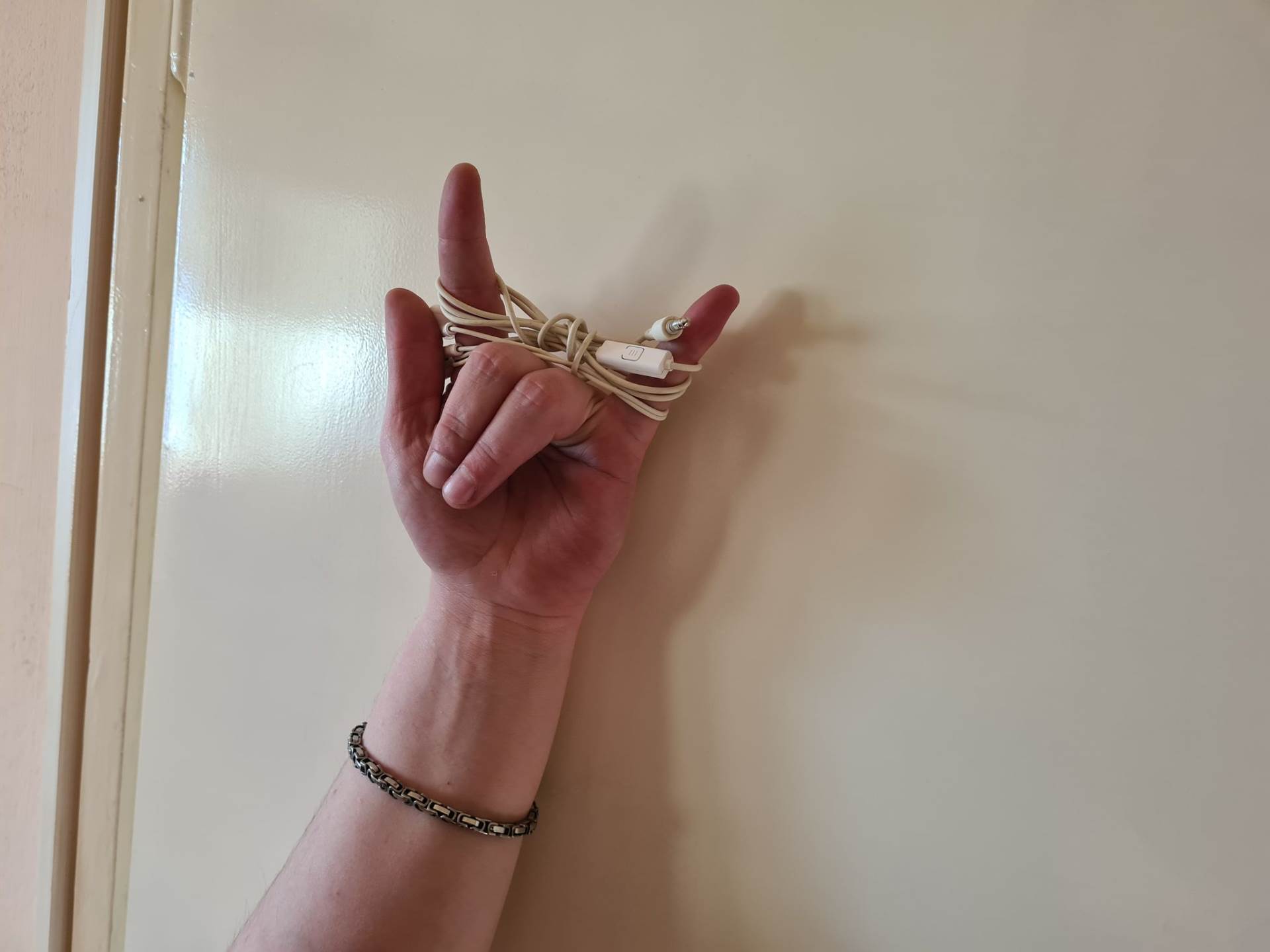 zapetljane slušalice zamršene mobilni telefoni kako spakovati slušalice da se ne zamrse kablovi